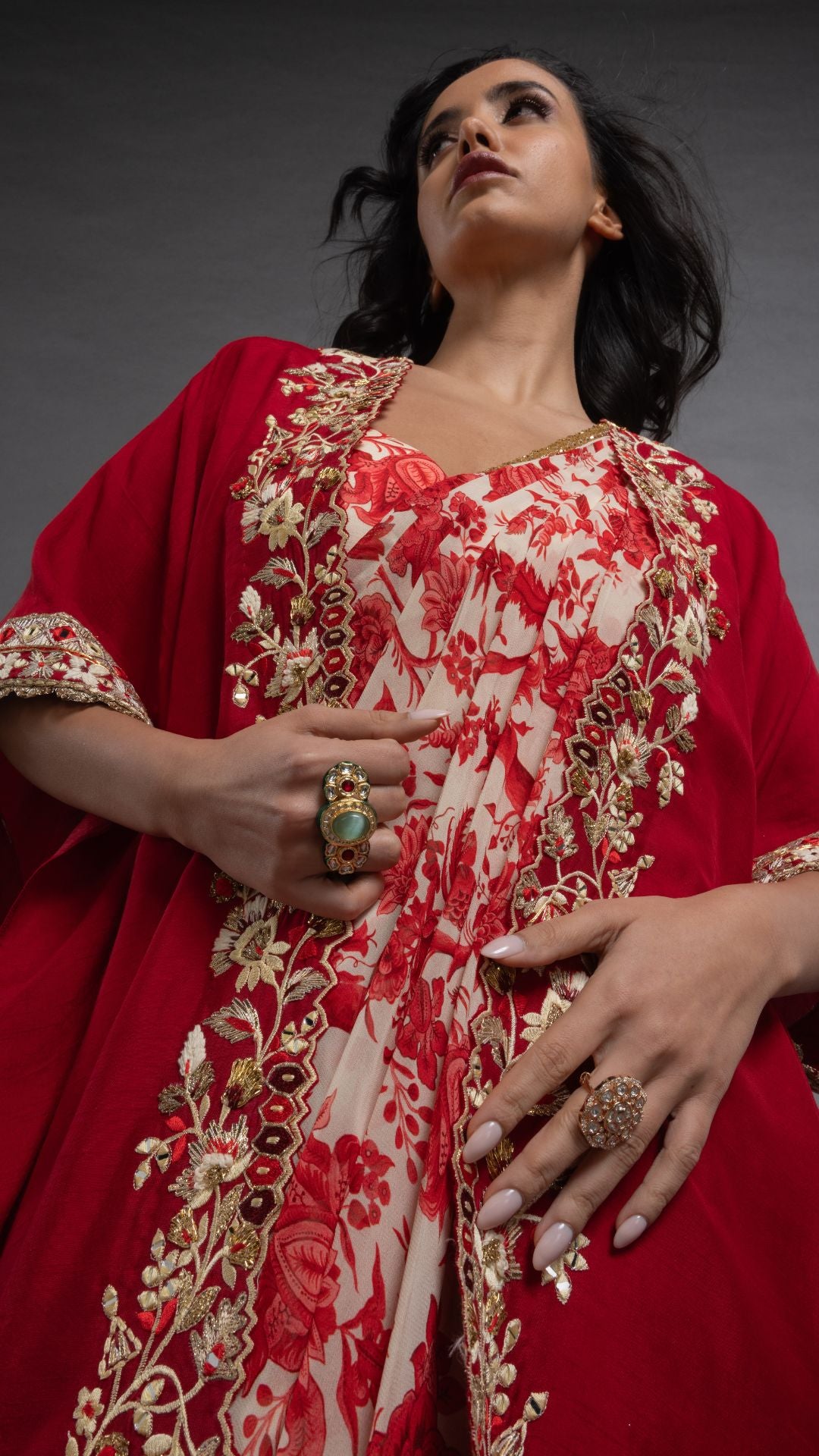 Red Printed Saree with Printed Bustier and Red Circular Cape with Slit Sleeve