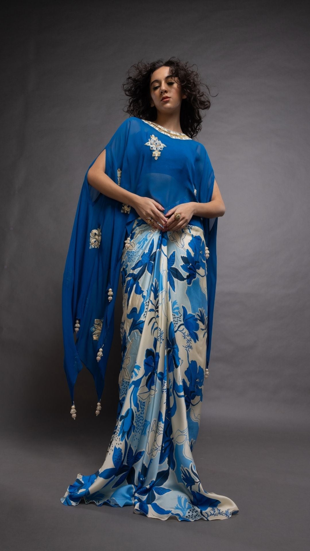 Royal Blue Embroidered Short Closed Neck Poncho with A Bustier and Floral Abstract Printed Drape Skirt
