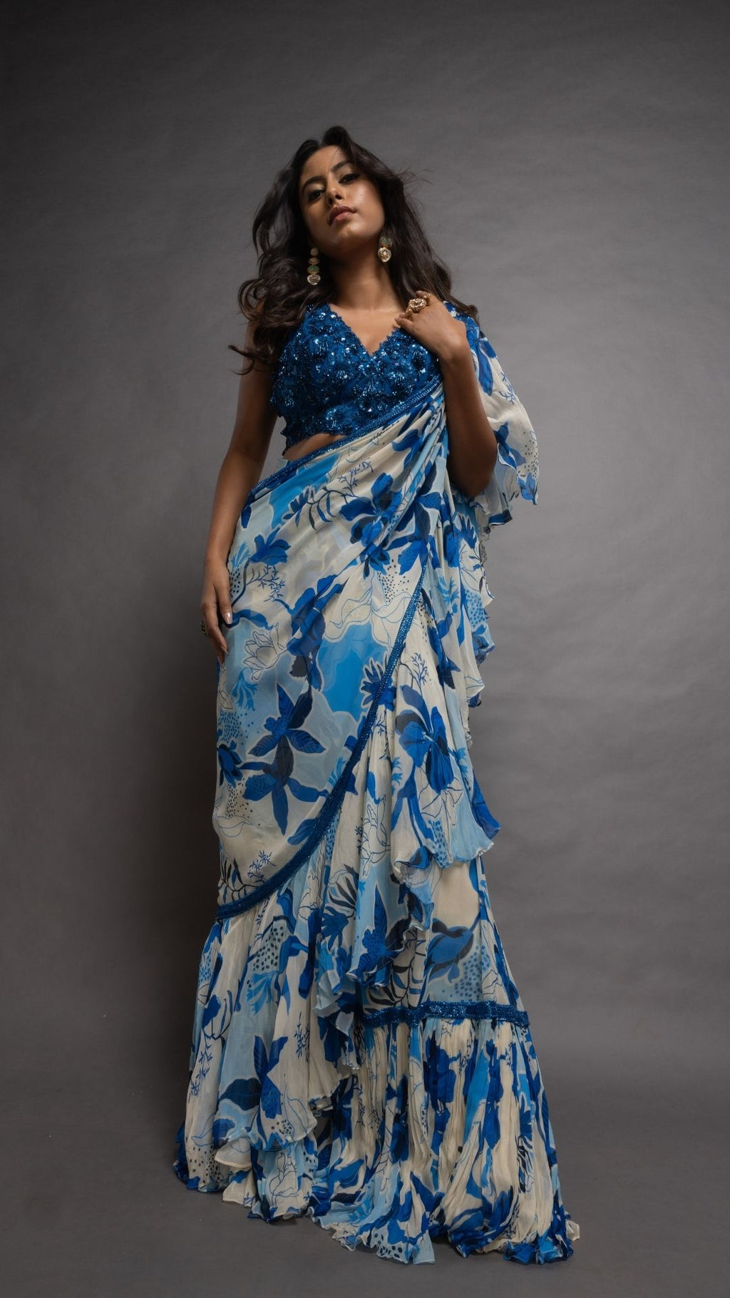 Royal Blue V-Neck Embroidered Cutwork Blouse with Blue Floral Abstract Printed Big Frill Saree