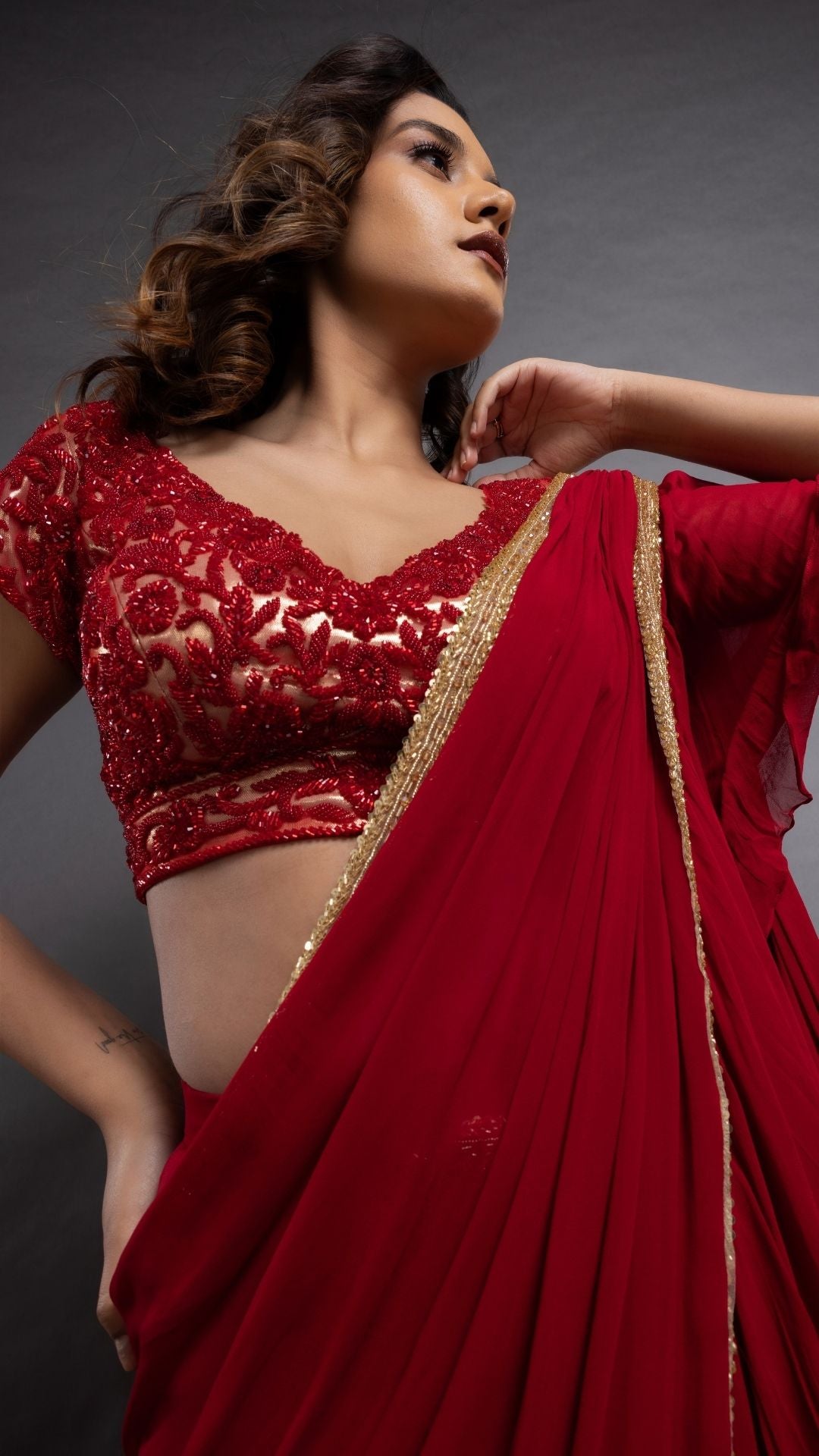 Red Frill Saree with Embroidered Pan Neck Choli