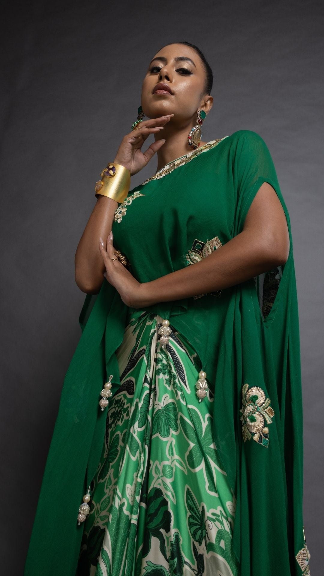 Green Embroidered Short Closed Neck Poncho with A Bustier and Floral Abstract Printed Drape Skirt