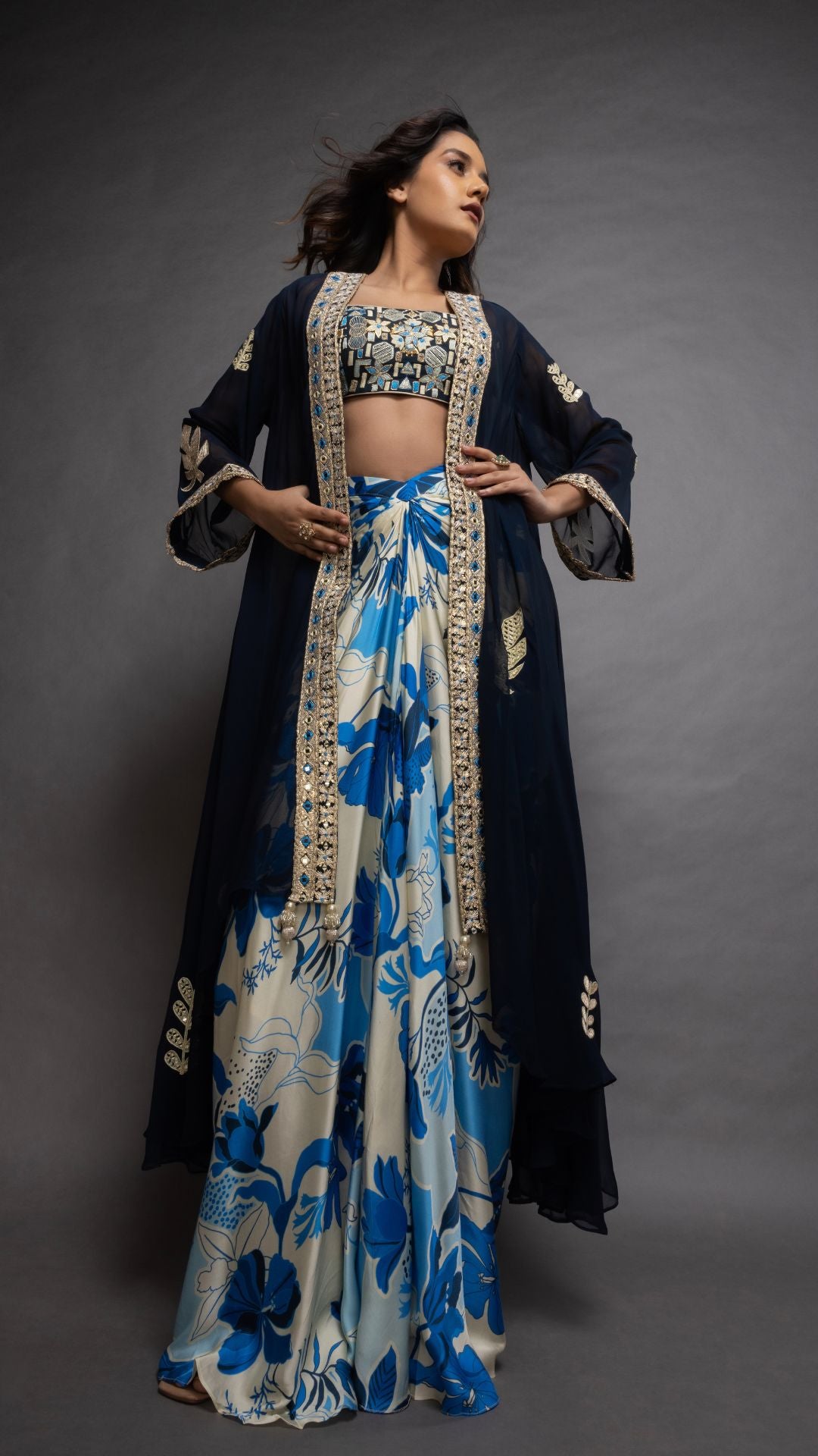 Solid Blue Embroidered Waterfall Cape with Embroiderd Bustier and Abstract Floral Printed Drape Skirt