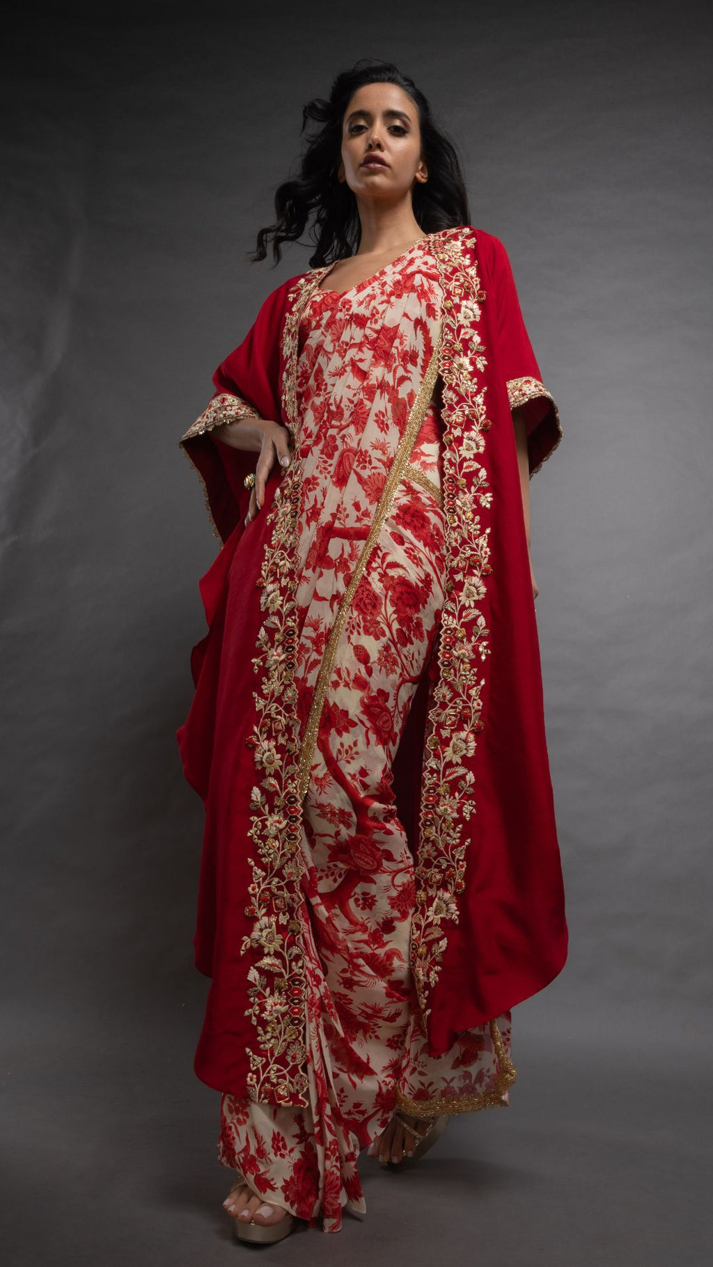 Red Printed Saree with Printed Bustier and Red Circular Cape with Slit Sleeve