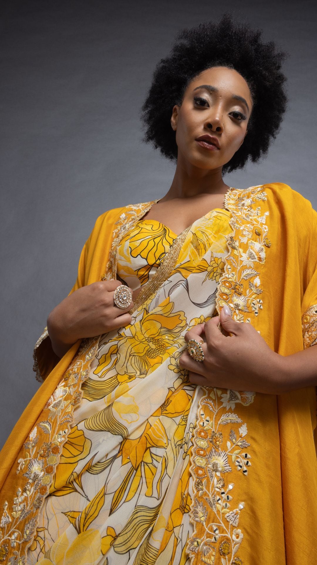 Musturd Printed Saree with Printed Bustier and Musturd Circular Cape with Slit Sleeve