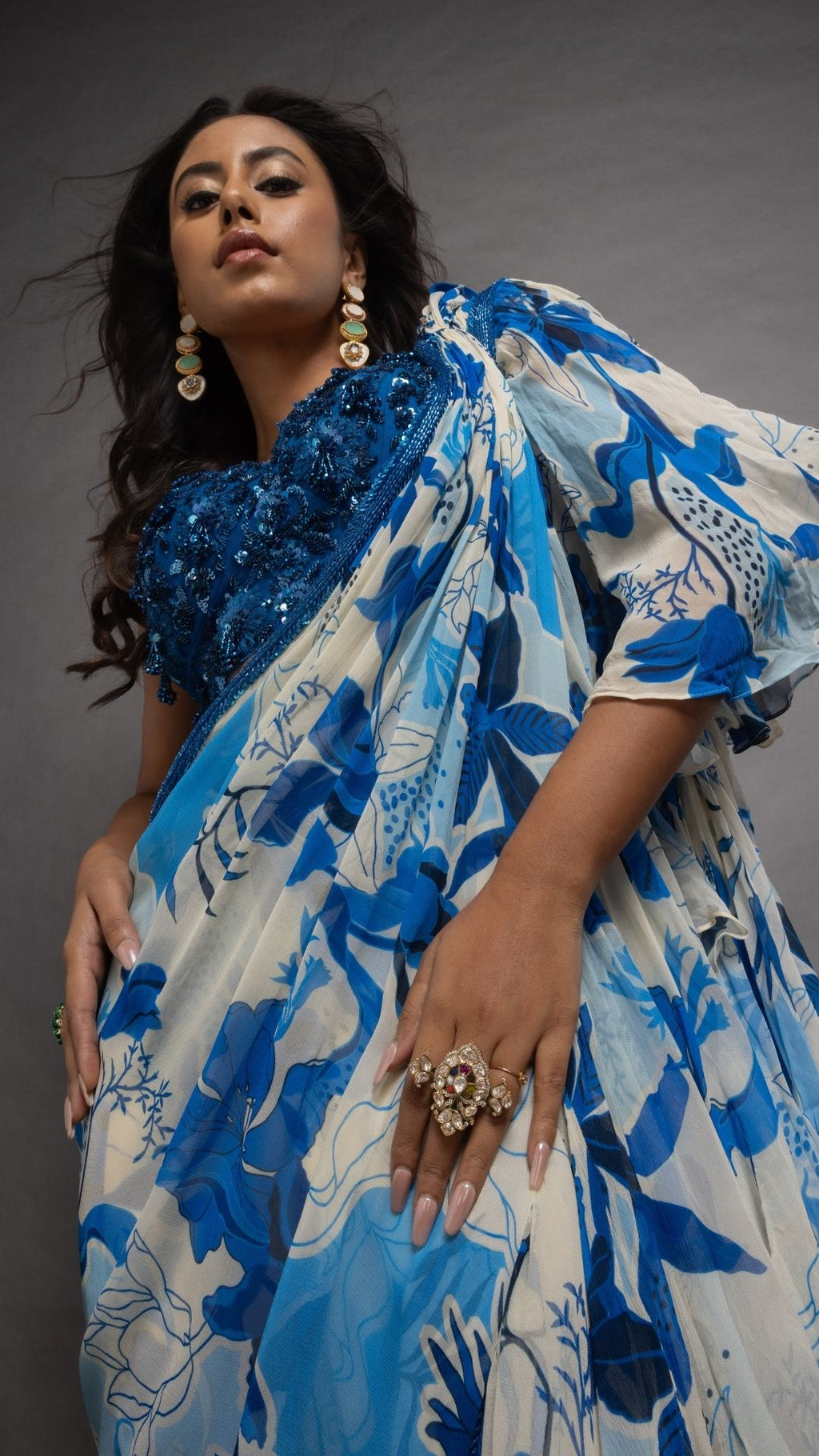 Royal Blue V-Neck Embroidered Cutwork Blouse with Blue Floral Abstract Printed Big Frill Saree