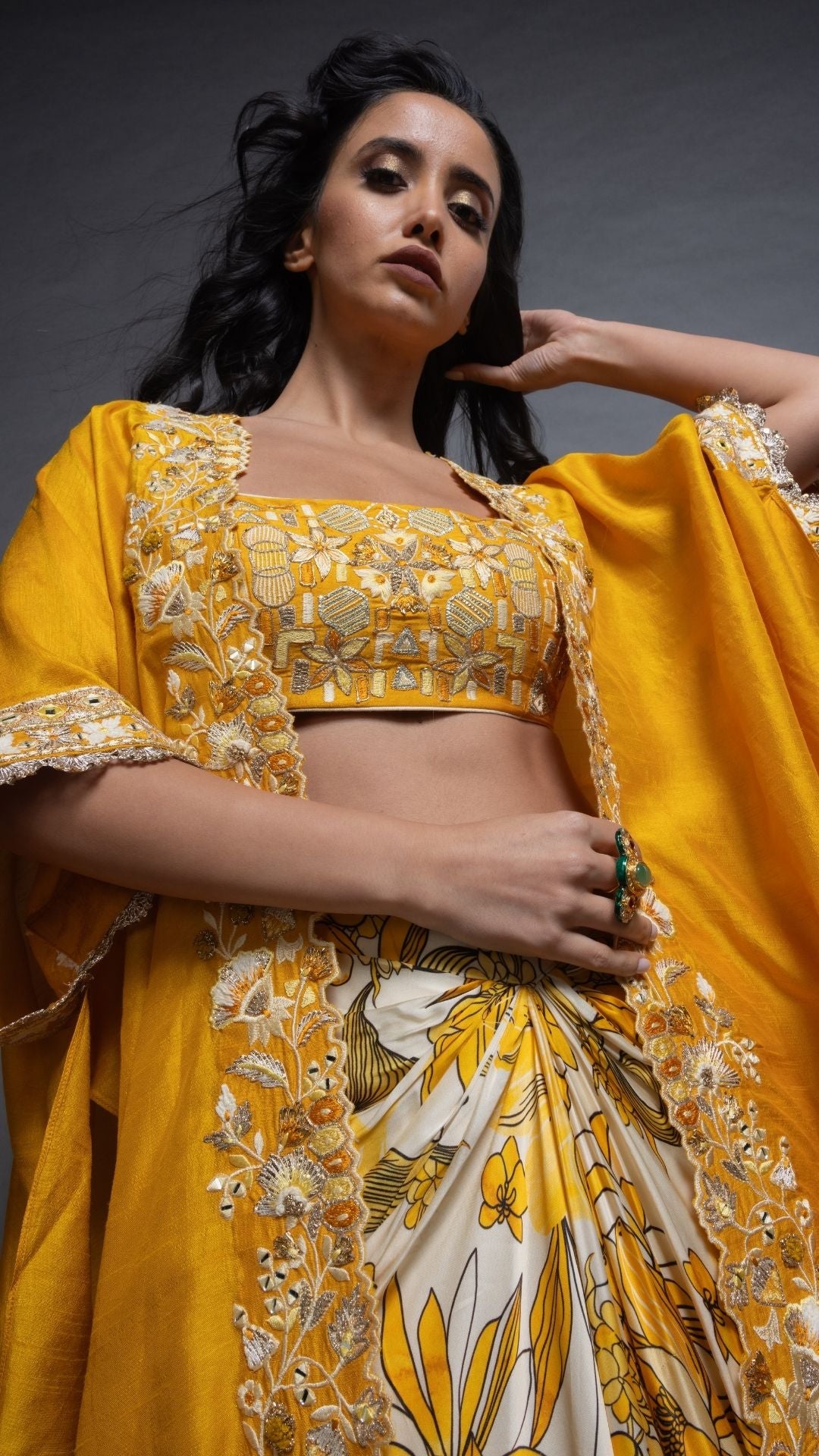 Musturd Silk Cutwork Cape with Embroidered Bustier and Printed Modal Drape Skirt