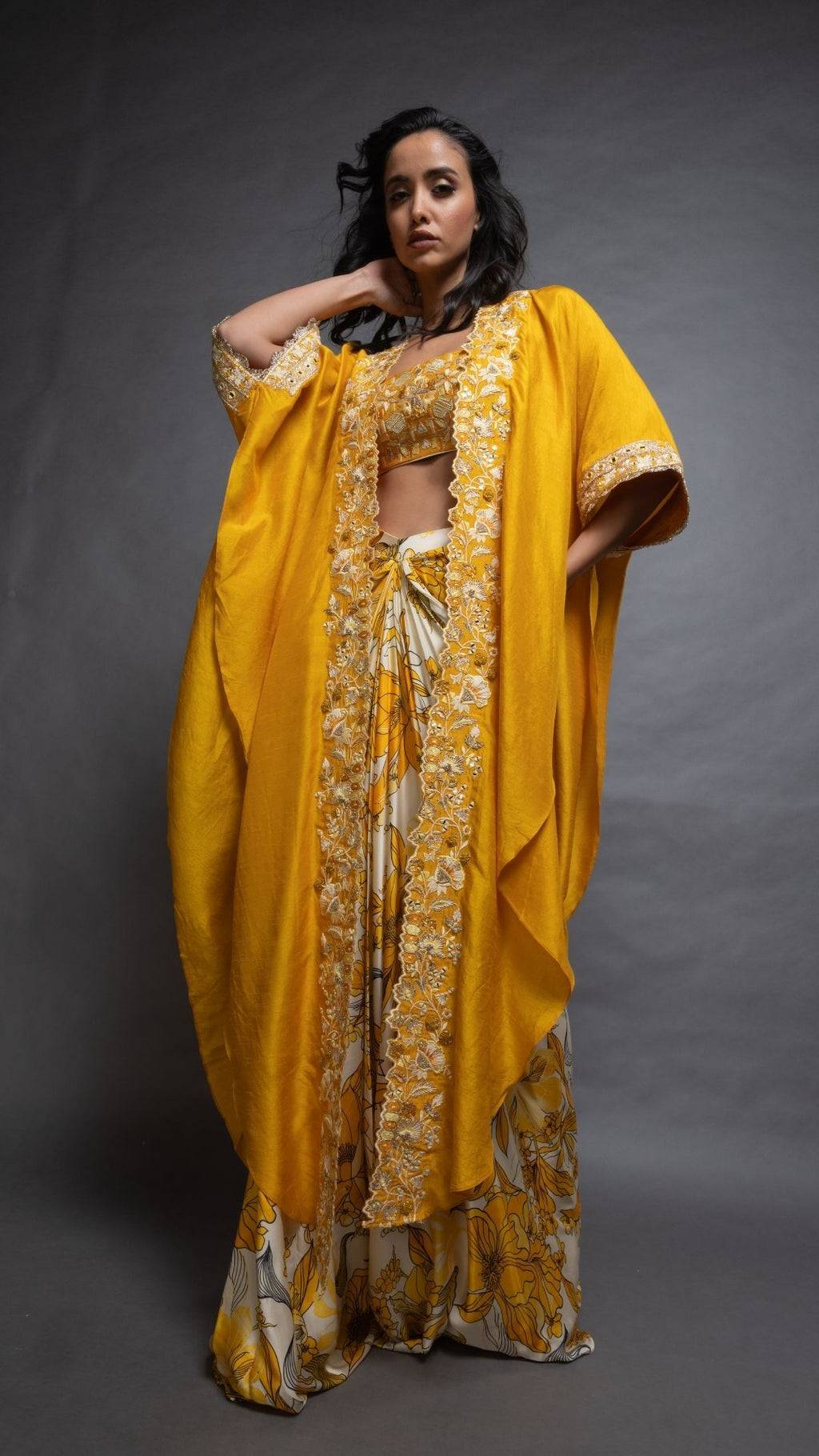 Musturd Silk Cutwork Cape with Embroidered Bustier and Printed Modal Drape Skirt