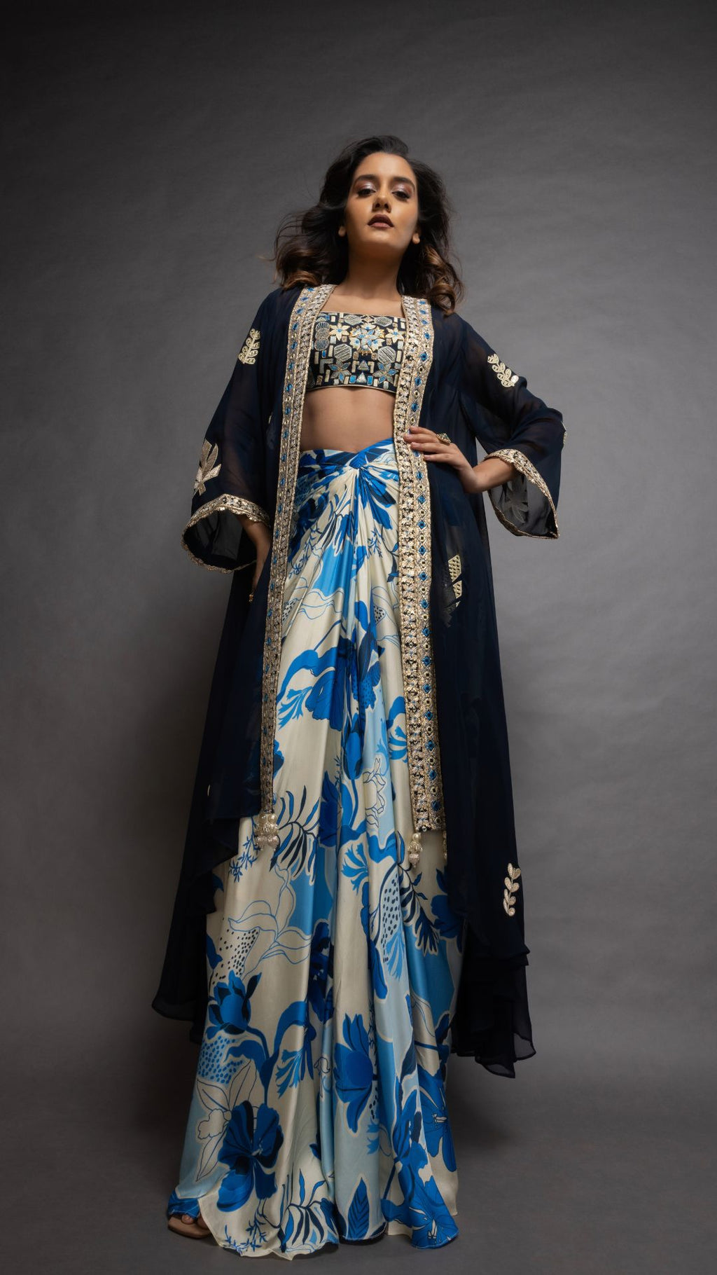 Solid Blue Embroidered Waterfall Cape with Embroiderd Bustier and Abstract Floral Printed Drape Skirt