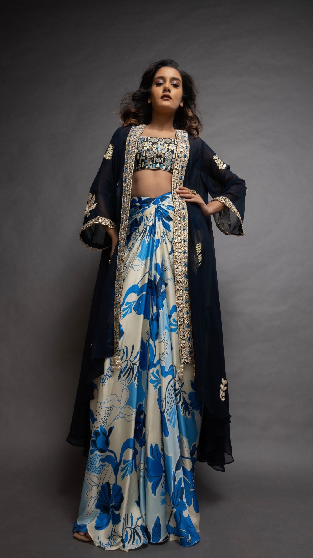 Solid Blue Embroidered Waterfall Cape with Embroiderd Bustier and Abstract Floral Printed Drape Skirt