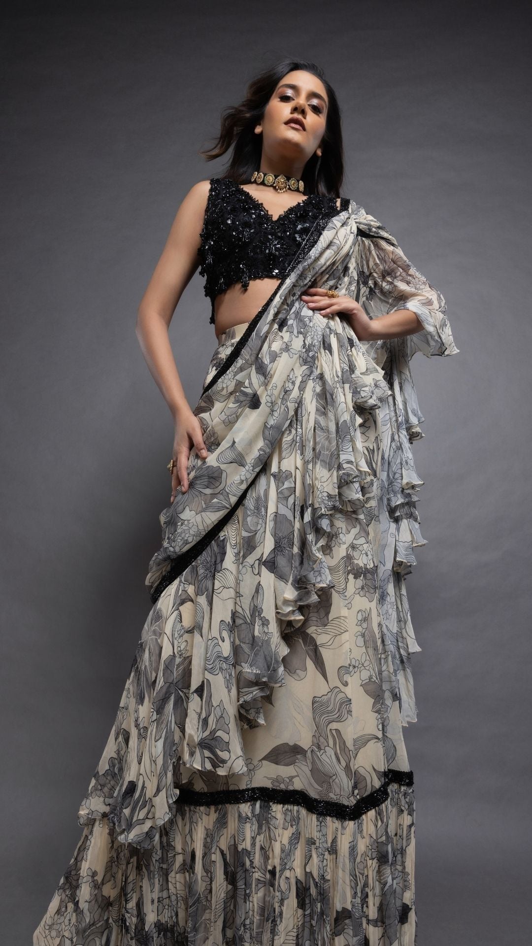 Grey Floral Abstract Printed Big Frill Saree with Black V-Neck Embroidered Cutwork Choli