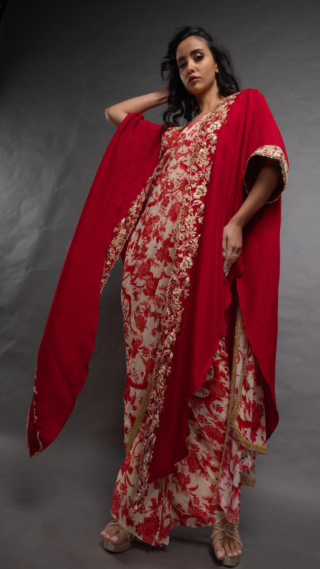 Red Printed Saree with Printed Bustier and Red Circular Cape with Slit Sleeve
