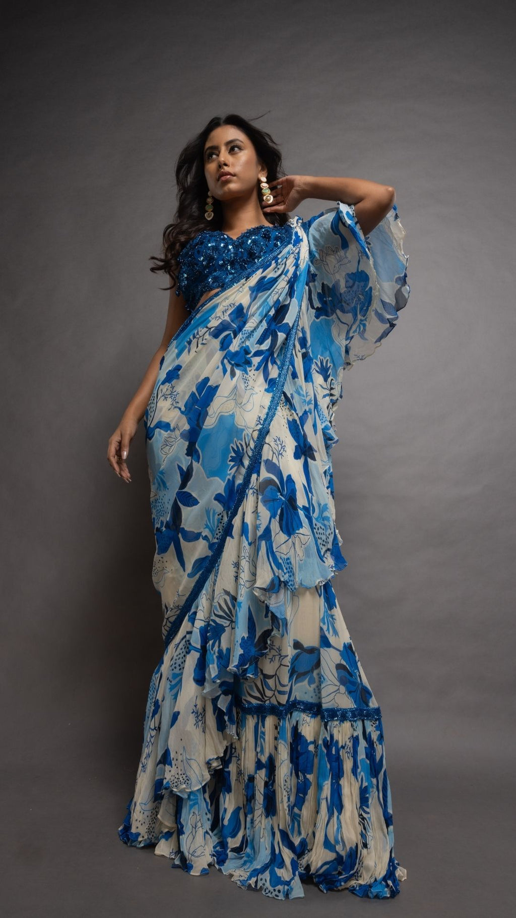 Royal Blue V-Neck Embroidered Cutwork Blouse with Blue Floral Abstract Printed Big Frill Saree