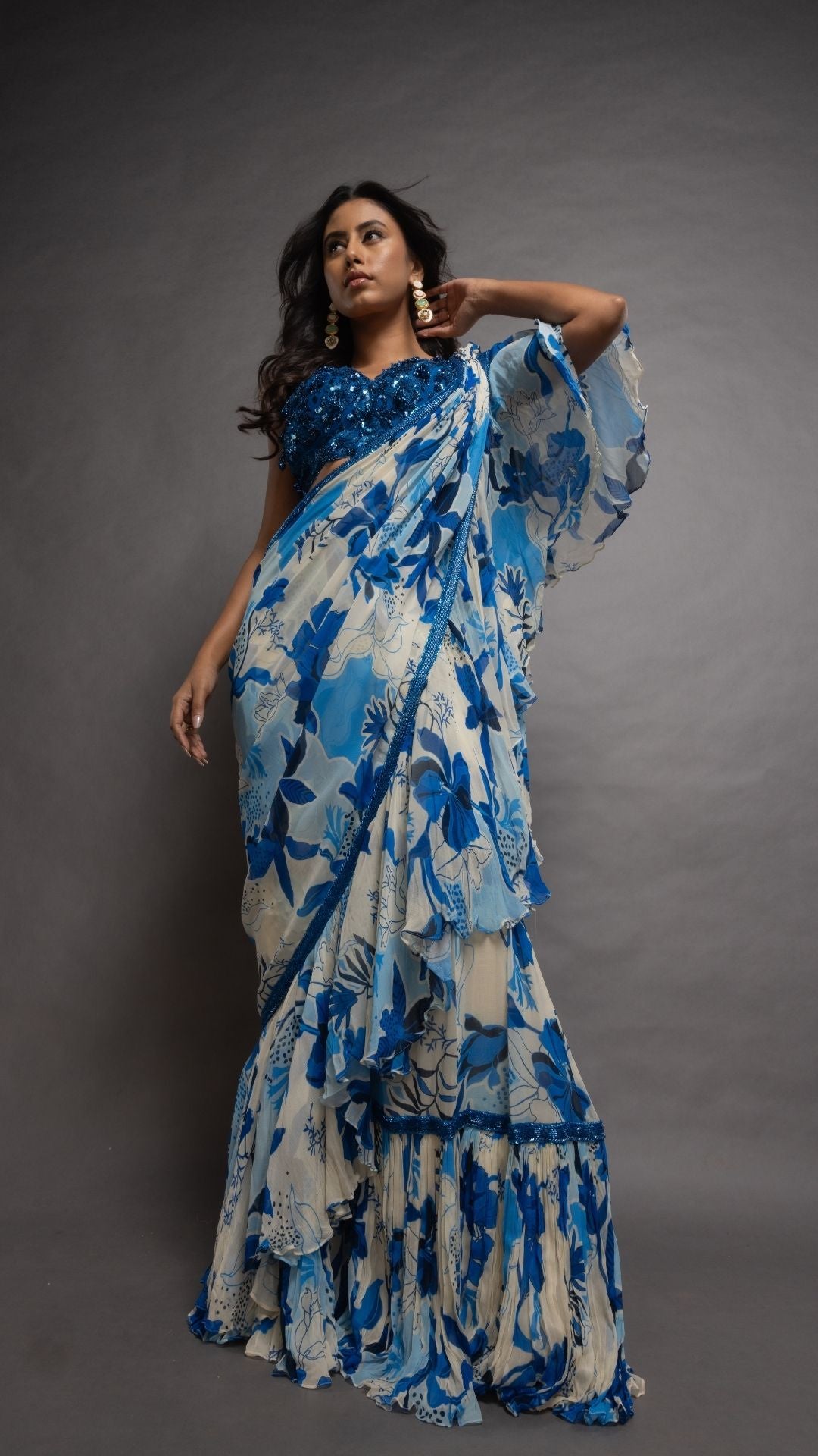 Royal Blue V-Neck Embroidered Cutwork Blouse with Blue Floral Abstract Printed Big Frill Saree
