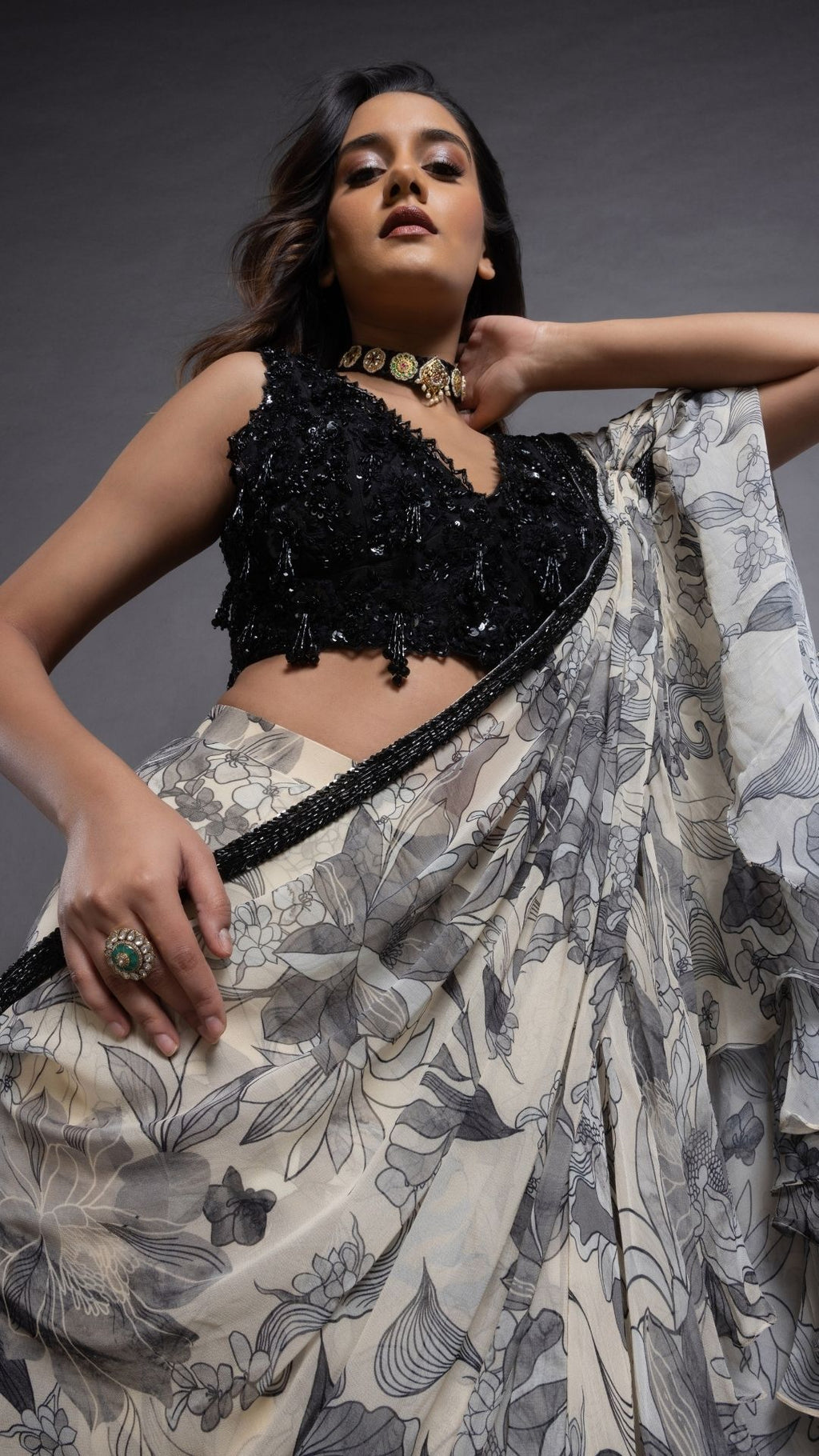 Grey Floral Abstract Printed Big Frill Saree with Black V-Neck Embroidered Cutwork Choli