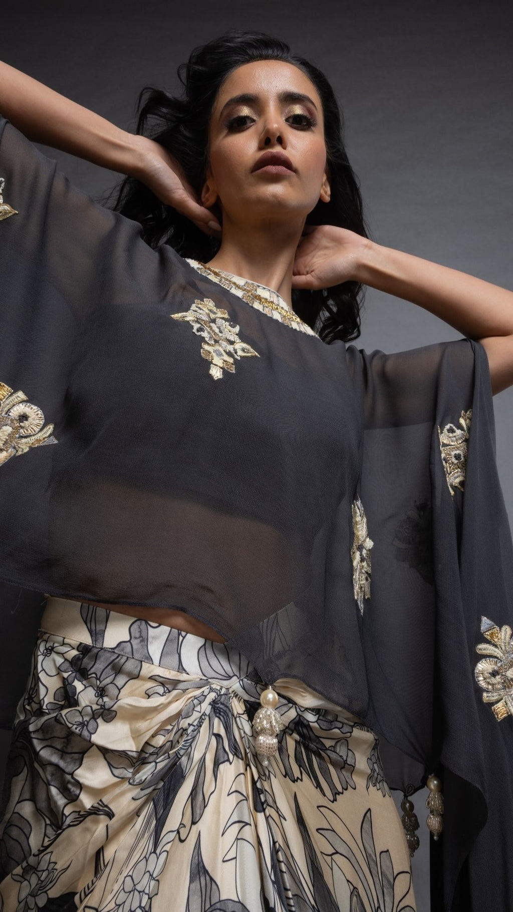 Grey Embroidered Short Closed Neck Poncho with A Bustier and Floral Abstract Printed Drape Skirt