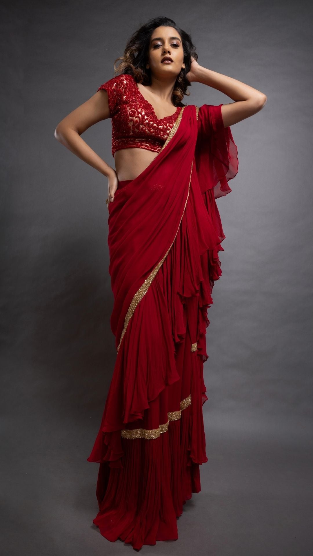 Red Frill Saree with Embroidered Pan Neck Choli