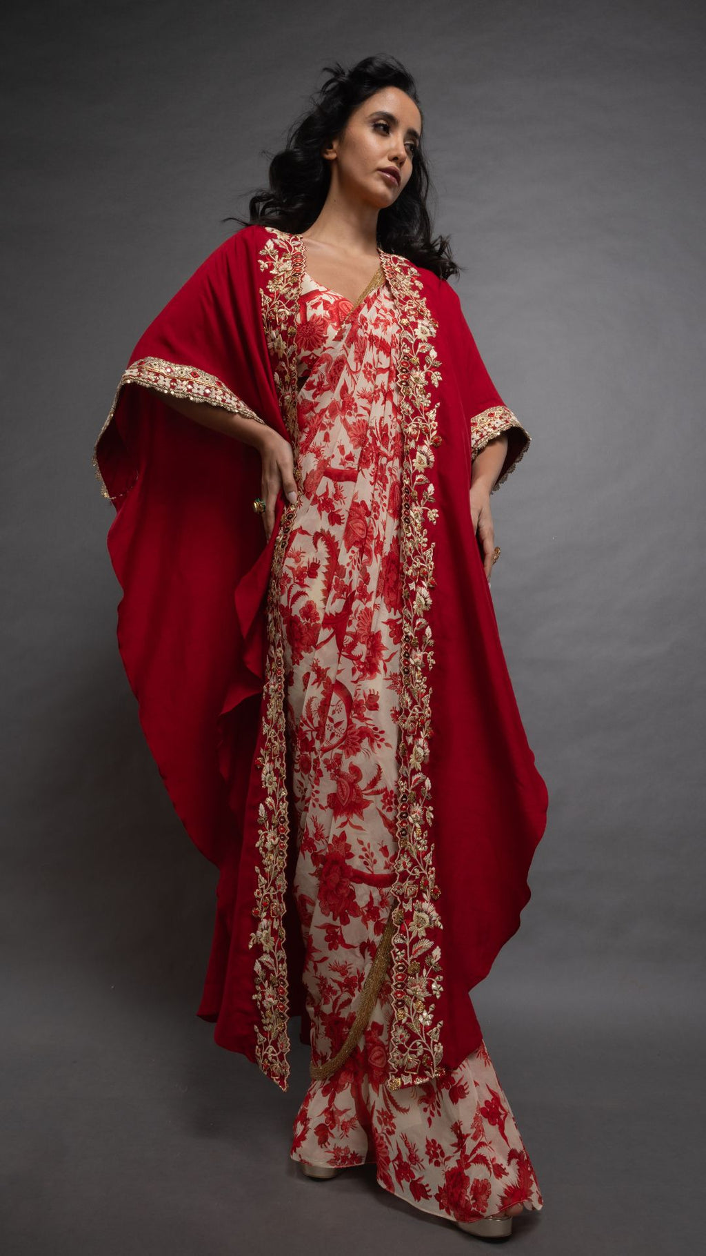Red Printed Saree with Printed Bustier and Red Circular Cape with Slit Sleeve