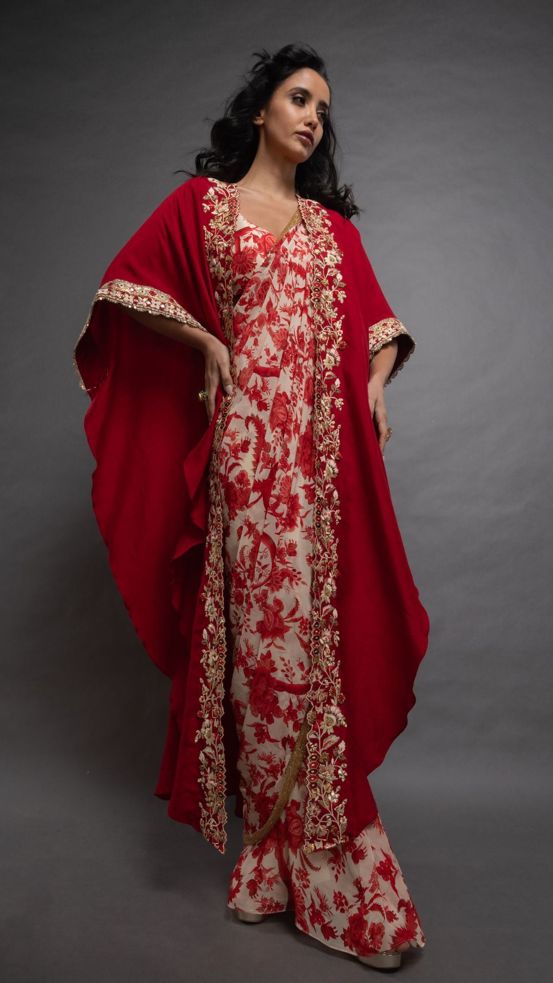 Red Printed Saree with Printed Bustier and Red Circular Cape with Slit Sleeve