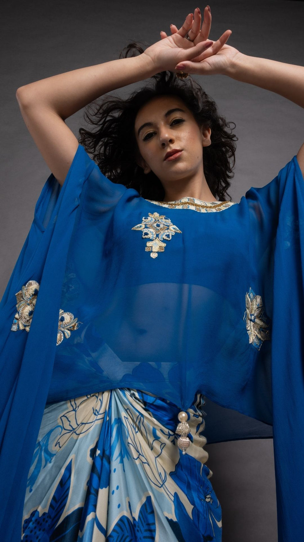 Royal Blue Embroidered Short Closed Neck Poncho with A Bustier and Floral Abstract Printed Drape Skirt