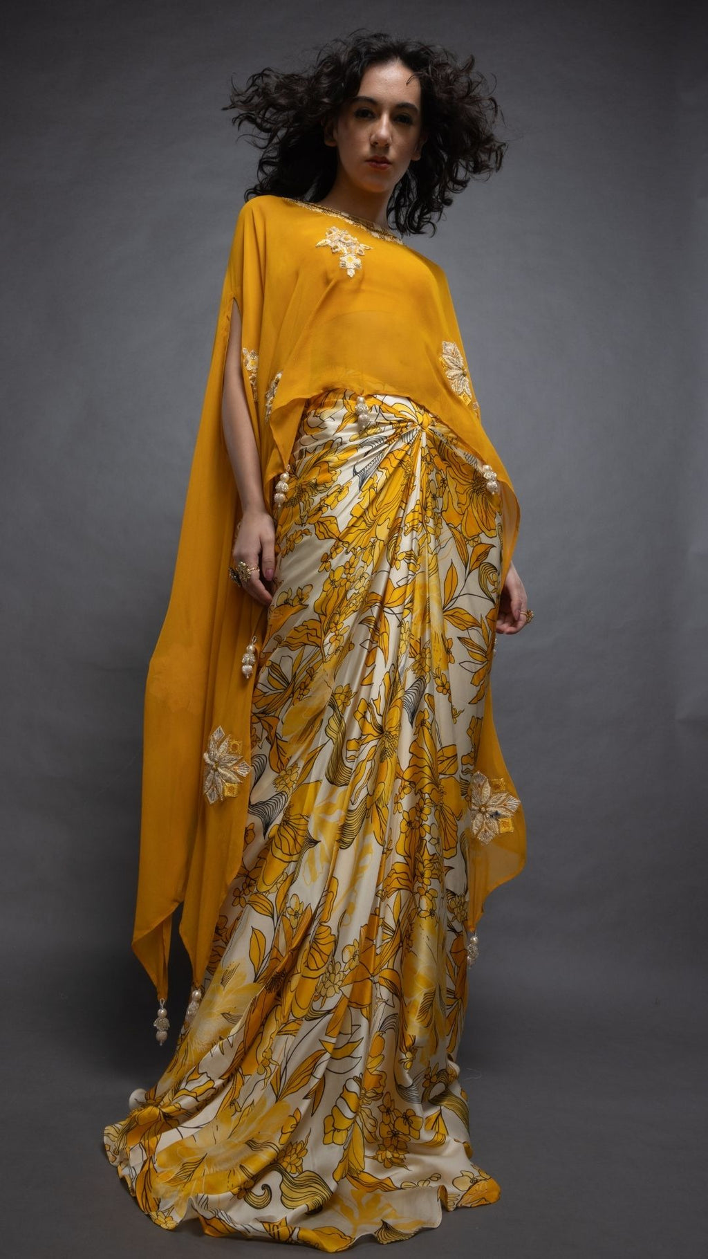 Mustard Embroidered Short Closed Neck Poncho with A Bustier and Floral Abstract Printed Drape Skirt